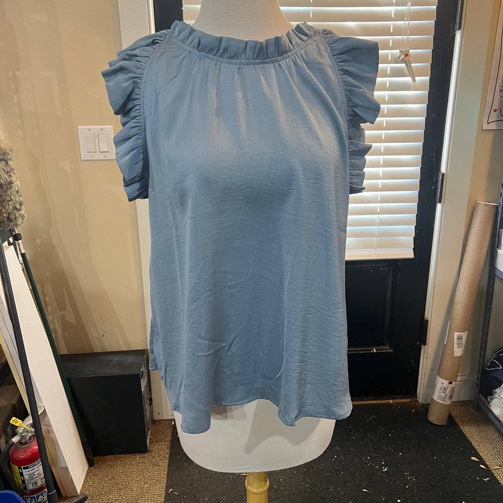 Blu pepper sleeveless ruffle trim blouse